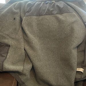 It’s a 4 x grey button down coat polo by Ralph Lauren